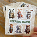 Load image into Gallery viewer, This images shows the Keeping Warm mini sheet