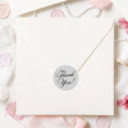 Load image into Gallery viewer, This image shows a silver Thank You! label on the back of an envelope.