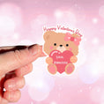 Load image into Gallery viewer, This image shows a hand holding the personalized valentine sticker.