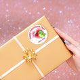 Load image into Gallery viewer, This image shows the valentine sticker on a package.
