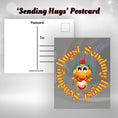 Load image into Gallery viewer, This image shows the Sending Hugs postcard with a yellow dragon on the front.