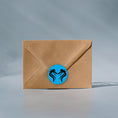 Load image into Gallery viewer, This image shows a Dragon label on the back of an envelope.