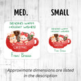 Load image into Gallery viewer, This image shows the medium and small holiday stickers side-by-side for a size comparison, and it says “Approximate dimensions are listed in the description.