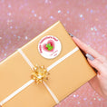 Load image into Gallery viewer, This image shows the valentine sticker on a package.