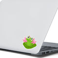 Load image into Gallery viewer, This image shows the froggy on a lily pad sticker on the back of an open laptop.