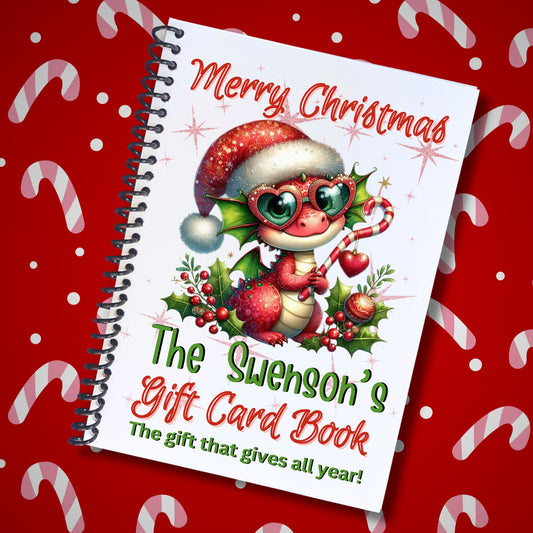 This image shows the Personalized Christmas 12 Month Gift Card Book with Stickers and PVC Cover - Cute Dragon.