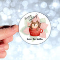 Load image into Gallery viewer, This image shows a hand holding the Personalized Holiday Stickers - Reindeer Mug.