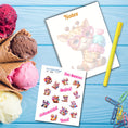 Load image into Gallery viewer, This image shows the Chibi Giraffe notepad with a sample pen (pen colors are randomly selected to complement each note pad), and the included sticker sheet as part of the Animals with Ice Cream Notepads.
