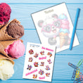 Load image into Gallery viewer, This image shows the Chibi Panda notepad with a sample pen (pen colors are randomly selected to complement each note pad), and the included sticker sheet as part of the Animals with Ice Cream Notepads.