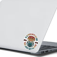 Load image into Gallery viewer, This image shows the Keep Biking - Gorilla Die-Cut Sticker on the back of an open laptop.