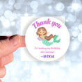 Load image into Gallery viewer, This image shows a hand holding the personalized mermaid themed thank you sticker.
