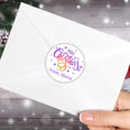 Load image into Gallery viewer, This image shows the Personalized Holiday Stickers - Merry Christmas Purple on the back of an envelope.