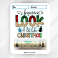 Load image into Gallery viewer, This image shows the money tube attached to the Beginning to Look a lot Like Christmas Money Card.