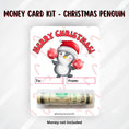 Load image into Gallery viewer, This image shows the money tube attached to the Christmas Penguin Money Card.