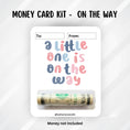 Load image into Gallery viewer, This image shows the money tube attached to the Little one on the way Money Card.