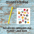 Load image into Gallery viewer, This image show a randomly chosen color (yellow) pen and the sticker/label sheet that comes with the cruising notepad.