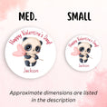 Load image into Gallery viewer, This image shows medium and small personalized valentine stickers next to each other as a size comparison.