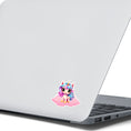 Load image into Gallery viewer, This image shows the pink chibi unicorn sticker on the back of an open laptop.