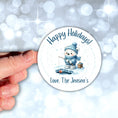 Load image into Gallery viewer, This image shows a hand holding the Personalized Holiday Stickers - Polar Bear Fishing.