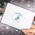 Load image into Gallery viewer, This image shows the Personalized Holiday Stickers - Polar Bear Fishing on the back of an envelope.
