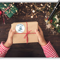 Load image into Gallery viewer, This image shows a package with the Personalized Holiday Stickers - Polar Bear Fishing on it.