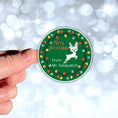 Load image into Gallery viewer, This image shows a hand holding the Personalized Holiday Stickers - Reindeer Christmas.