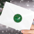 Load image into Gallery viewer, This image shows the Personalized Holiday Stickers - Reindeer Christmas on the back of an envelope.