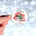 Load image into Gallery viewer, This image shows a hand holding the Personalized Holiday Stickers - Snowman Christmas.