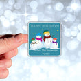 Load image into Gallery viewer, This image shows a hand holding the Personalized Holiday Stickers - Snowman Family Holiday.