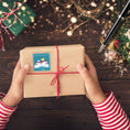 Load image into Gallery viewer, This image shows a package with the Personalized Holiday Stickers - Snowman Family Holiday on it.