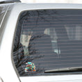 Load image into Gallery viewer, This image shows the toy train sticker on the back window of a car.