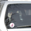 Load image into Gallery viewer, This image shows the Pink Butterfly Die-Cut Sticker on the back window of a car.