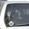 Load image into Gallery viewer, This image shows the Green Moth die cut sticker on the back window of a car.