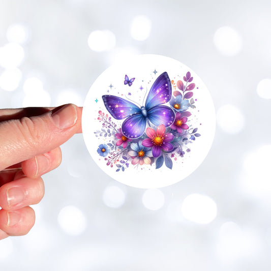 This image shows a hand holding the Purple and Blue Butterfly with Stars die cut sticker.