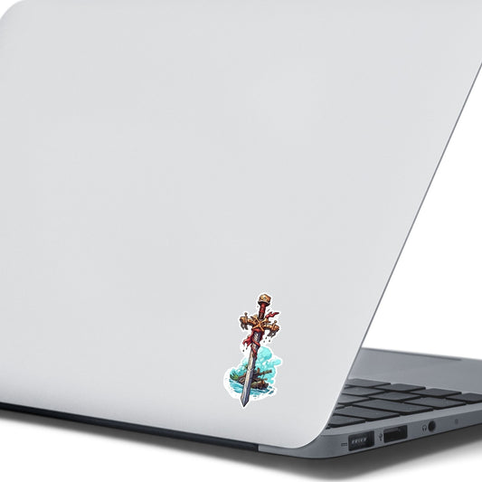 This image shows the Pirate Sword Die-Cut Sticker on the back of an open laptop.