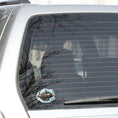 Load image into Gallery viewer, This image shows the Steampunk Airship 4 Die-Cut Sticker on the back window of a car.