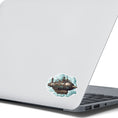 Load image into Gallery viewer, This image shows the Steampunk Airship 4 Die-Cut Sticker on the back of an open laptop.
