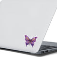 Load image into Gallery viewer, This image shows the Steampunk Butterfly 1 Die-Cut Sticker on the back of an open laptop.