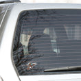 Load image into Gallery viewer, This image shows the Pirate Steampunk Pistol 2 Die-Cut Sticker on the back window of a car.