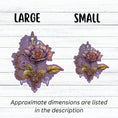 Load image into Gallery viewer, This image shows large and small steampunk rose stickers next to each other.