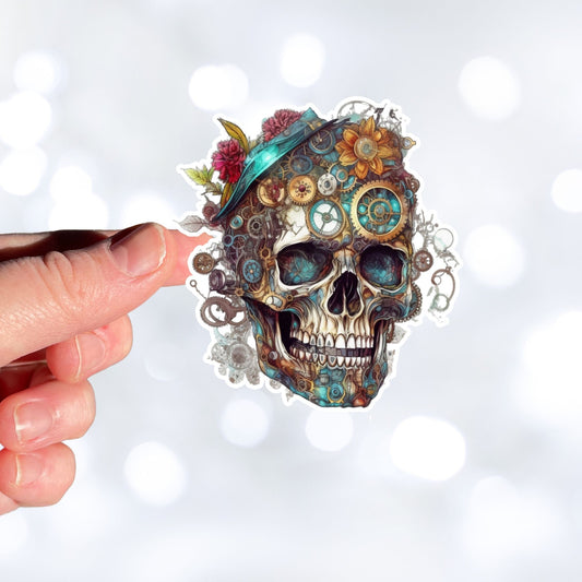 This image shows a hand holding the Steampunk Skull 2 Die-Cut Sticker.