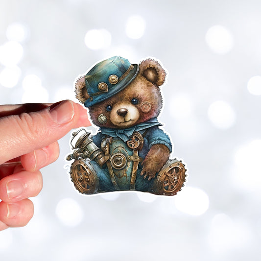 This image shows the steampunk teddy sticker on a finger.