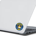 Load image into Gallery viewer, This image shows the Sticker Day! sticker on the back of an open laptop.