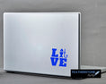 Load image into Gallery viewer, Love the fishing? Then show it with this fishing love square vinyl decal! Available in 4 sizes and 10 colors, these vinyl decals make great gifts for everyone. This image shows the Fishing Love Square vinyl decal on the back of an open laptop.