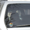 Load image into Gallery viewer, Hang 10 Bro! Catch a wave with this individual die-cut sticker featuring the silhouette of a female surfer inside the tube, all on a colored gradient background. Cowabunga! This image shows the Catching a Wave sticker on the back window of a car.