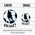 Load image into Gallery viewer, Show your love of soccer, or football, with this individual die-cut sticker! This sticker shows the silhouette of a player about to kick, on a black and white/blue soccer ball background, with the word "Goal!" below. This image shows the large and small soccer stickers next to each other.