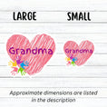 Load image into Gallery viewer, Show how much you love grandma with this individual die-cut sticker. This makes a great gift for grandma, or for all grandma's to proudly show they are a grandmother! This sticker features a red scribbled heart with Grandma written across the middle and 5 small paint hands on the lower left side. This image shows large and small Grandma die-cut stickers next to each other.