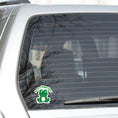 Load image into Gallery viewer, This inspirational sticker features a smiling frog with "Have a Hoppy Day!" written above. This image shows the Have a Hoppy Day sticker on the back window of a car.