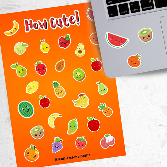 Filled with sticker images of cute fruit, this sticker sheet is sure to put a smile on anyone's face! This image shows the sticker sheet next to an open laptop with stickers of a watermelon slice, a kiwi, and an orange applied below the keyboard.