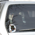 Load image into Gallery viewer, Steampunk Monkey has his own version of a steampunk hat and goggles, plus he is wearing goggles and surrounded by three steampunk butterflies. All on a blue and white background. This image shows the steampunk monkey sticker on the rear window of a car.